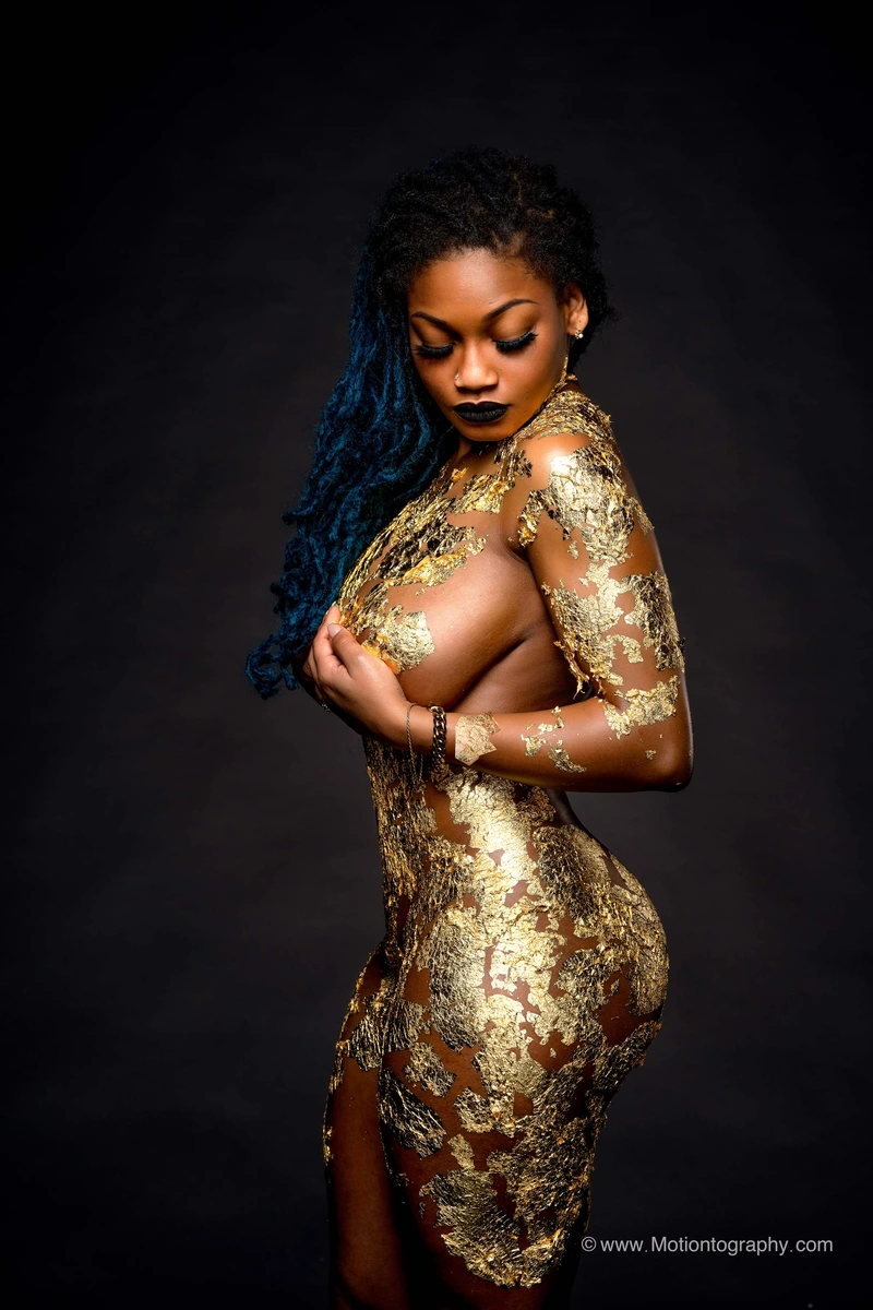 boudoir photography woman gold body art dreadlocks by Motiontography