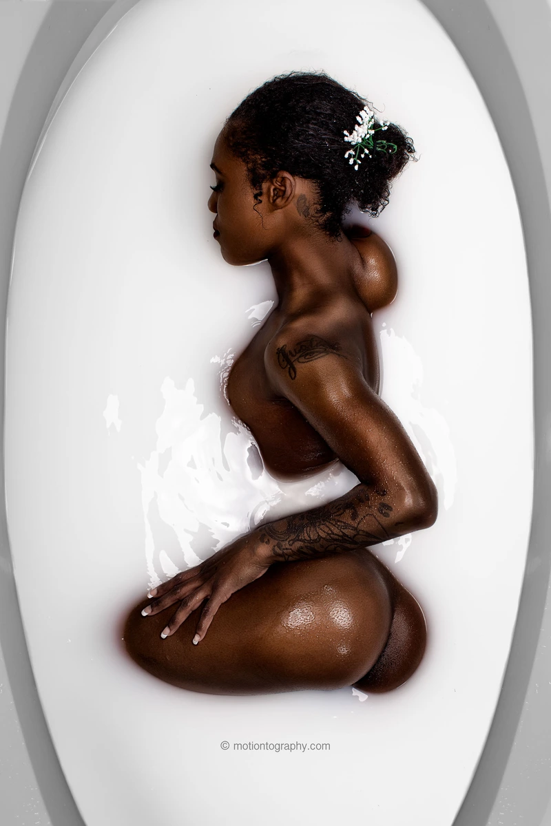 milk bath photography tattooed woman by Motiontography