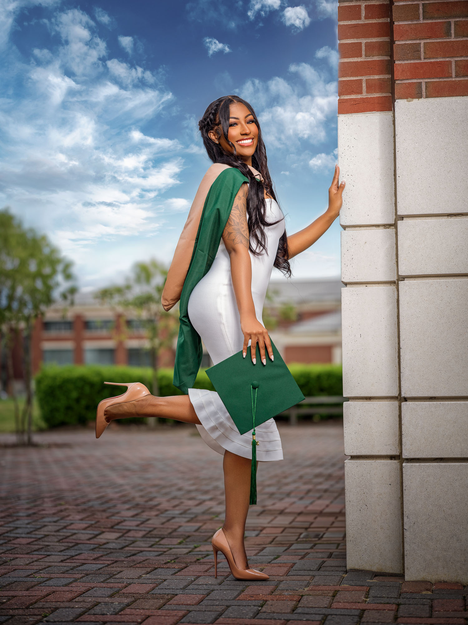 Celebratory Hampton University graduation portrait
