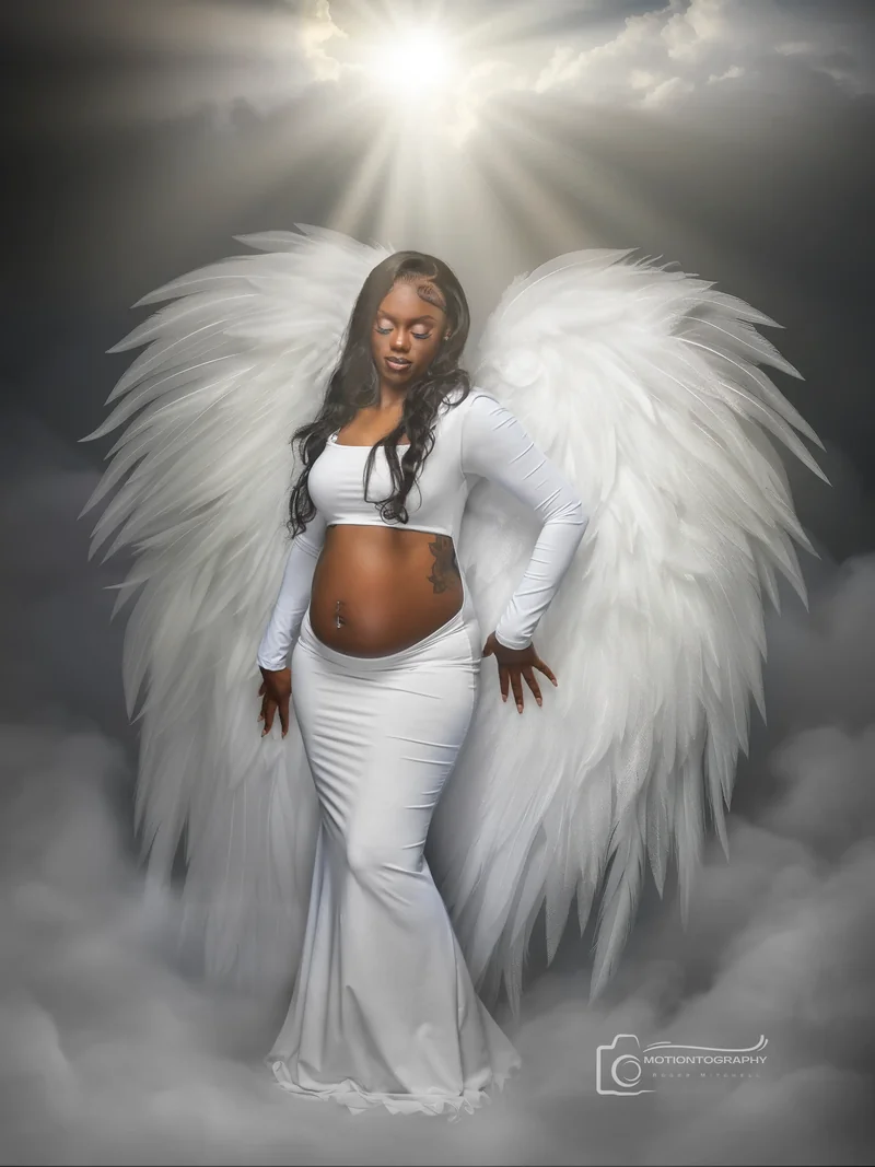 angelic wings maternity portrait by Motiontography