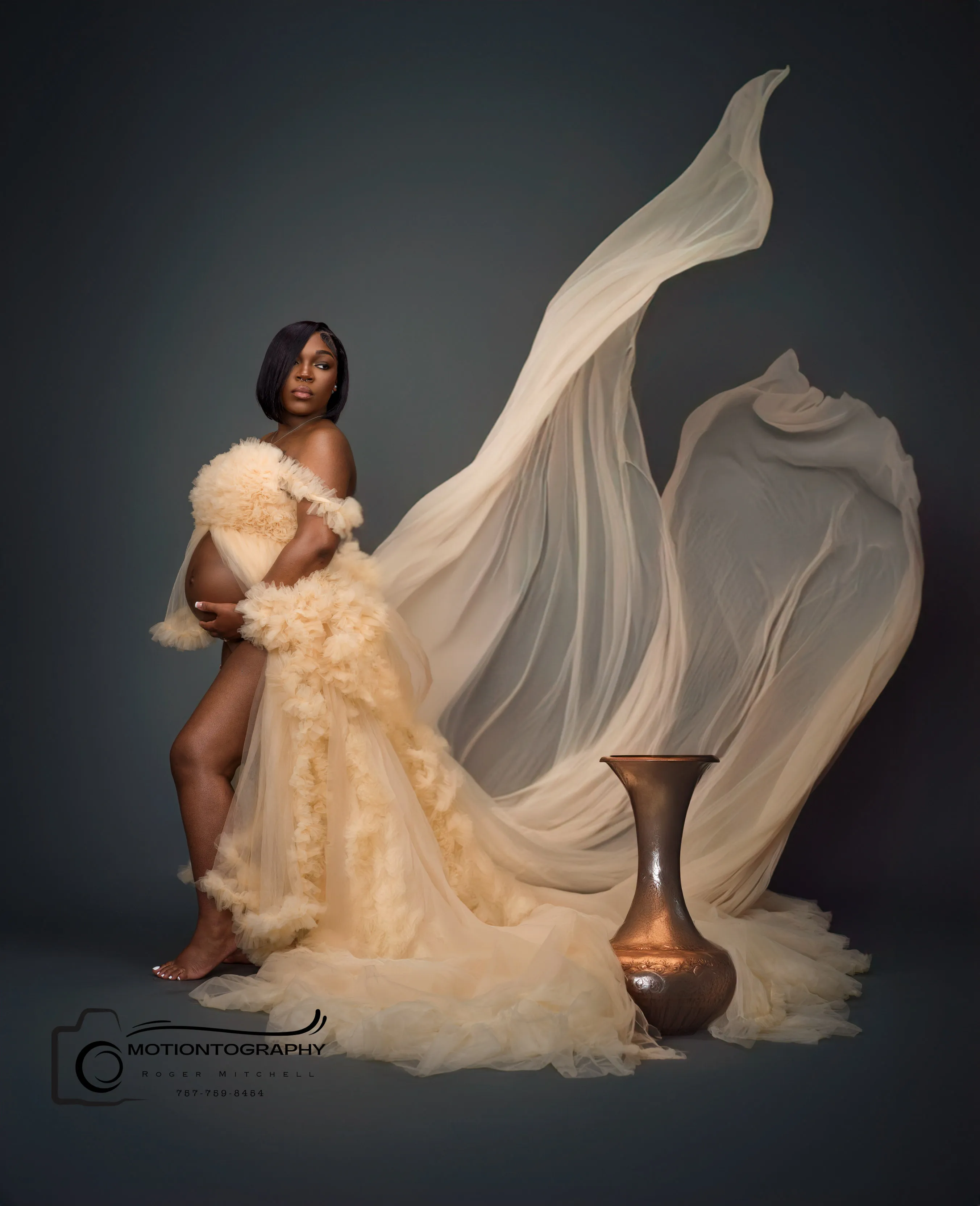 Plus-size maternity photography in stunning gown