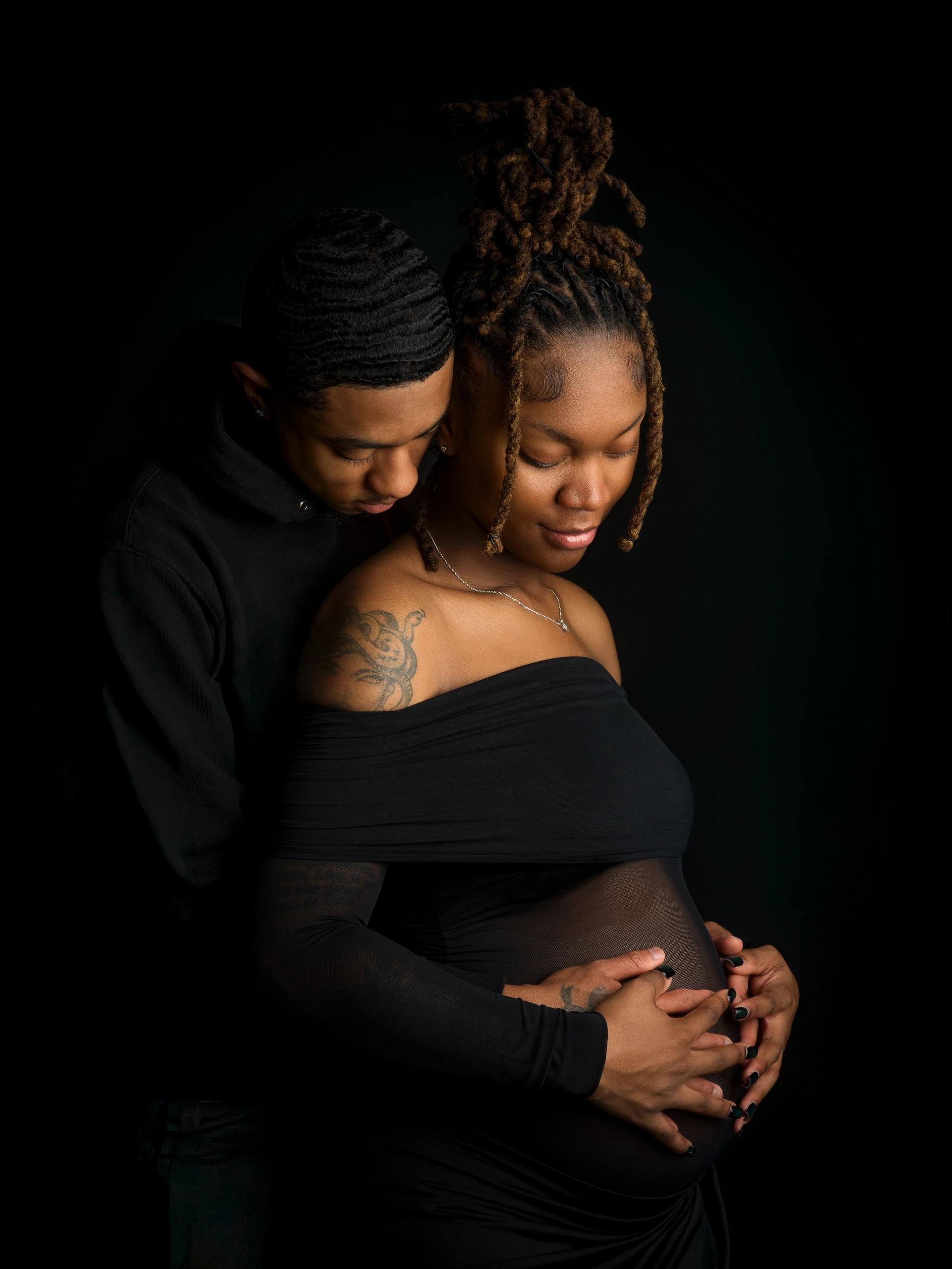 dramatic fine-art maternity portrait after Motiontography retouching