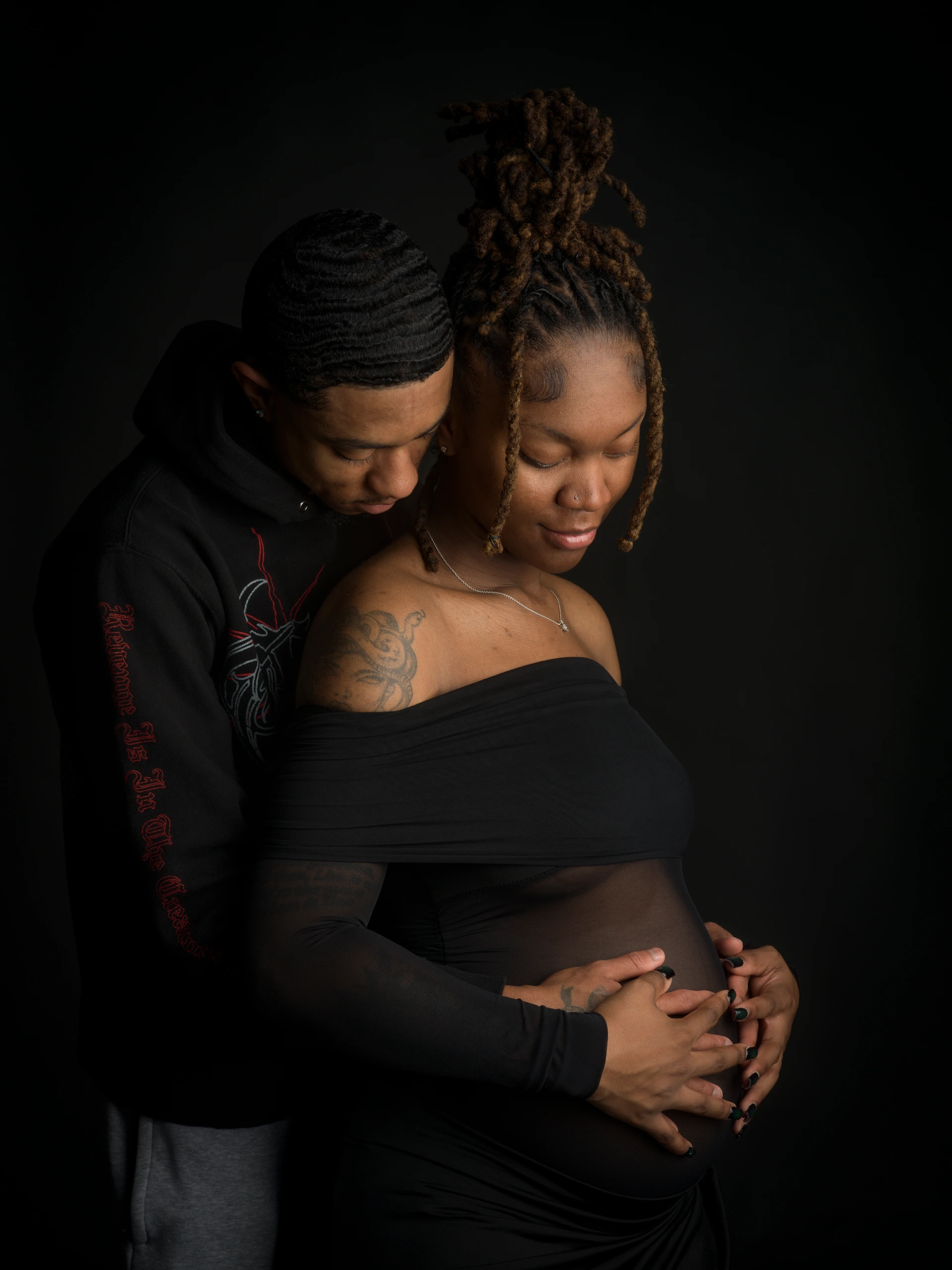dramatic fine-art maternity portrait before editing by Motiontography