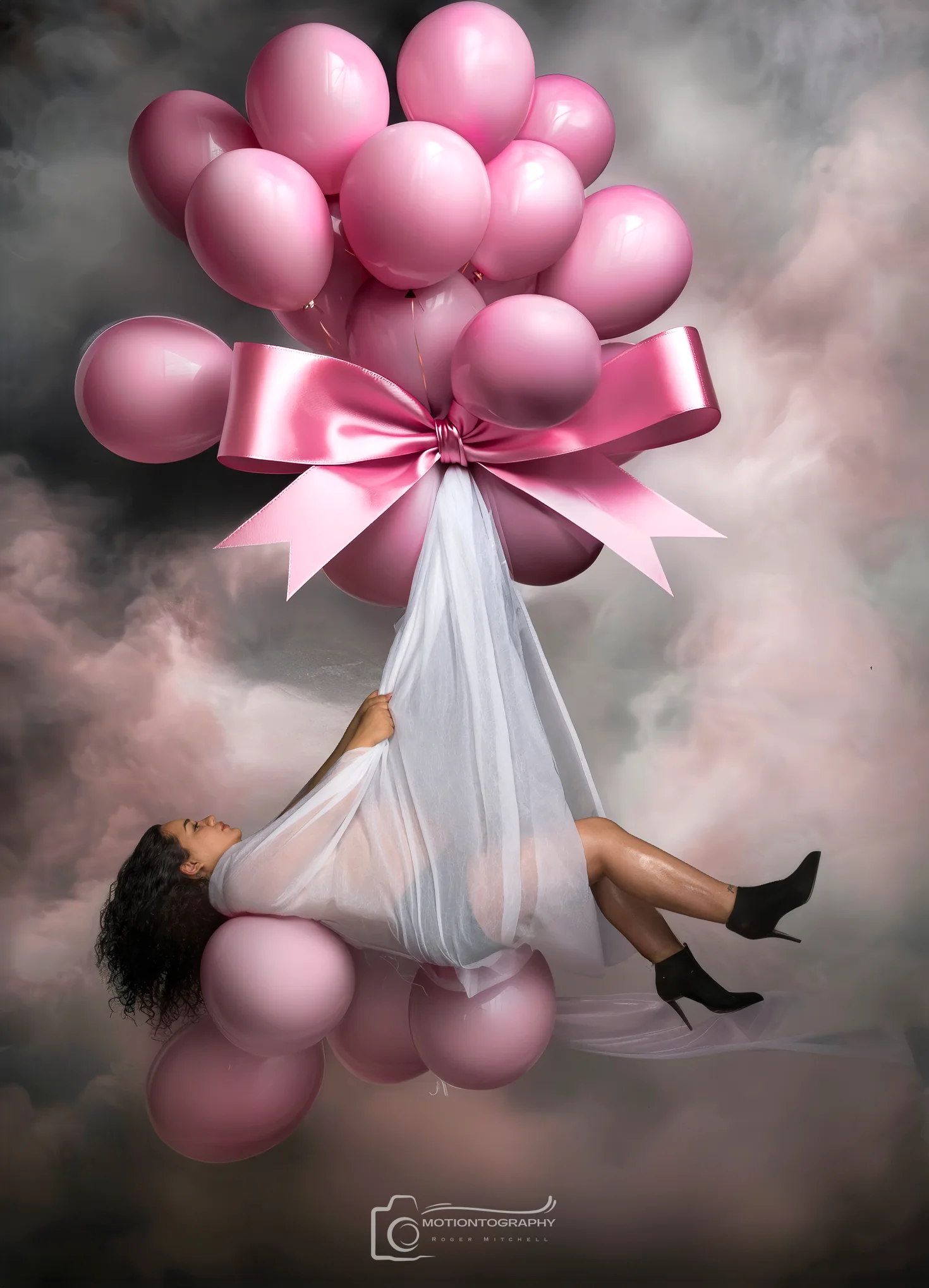 Hampton Roads maternity photographer floating pink balloon portrait with sheer white gown
