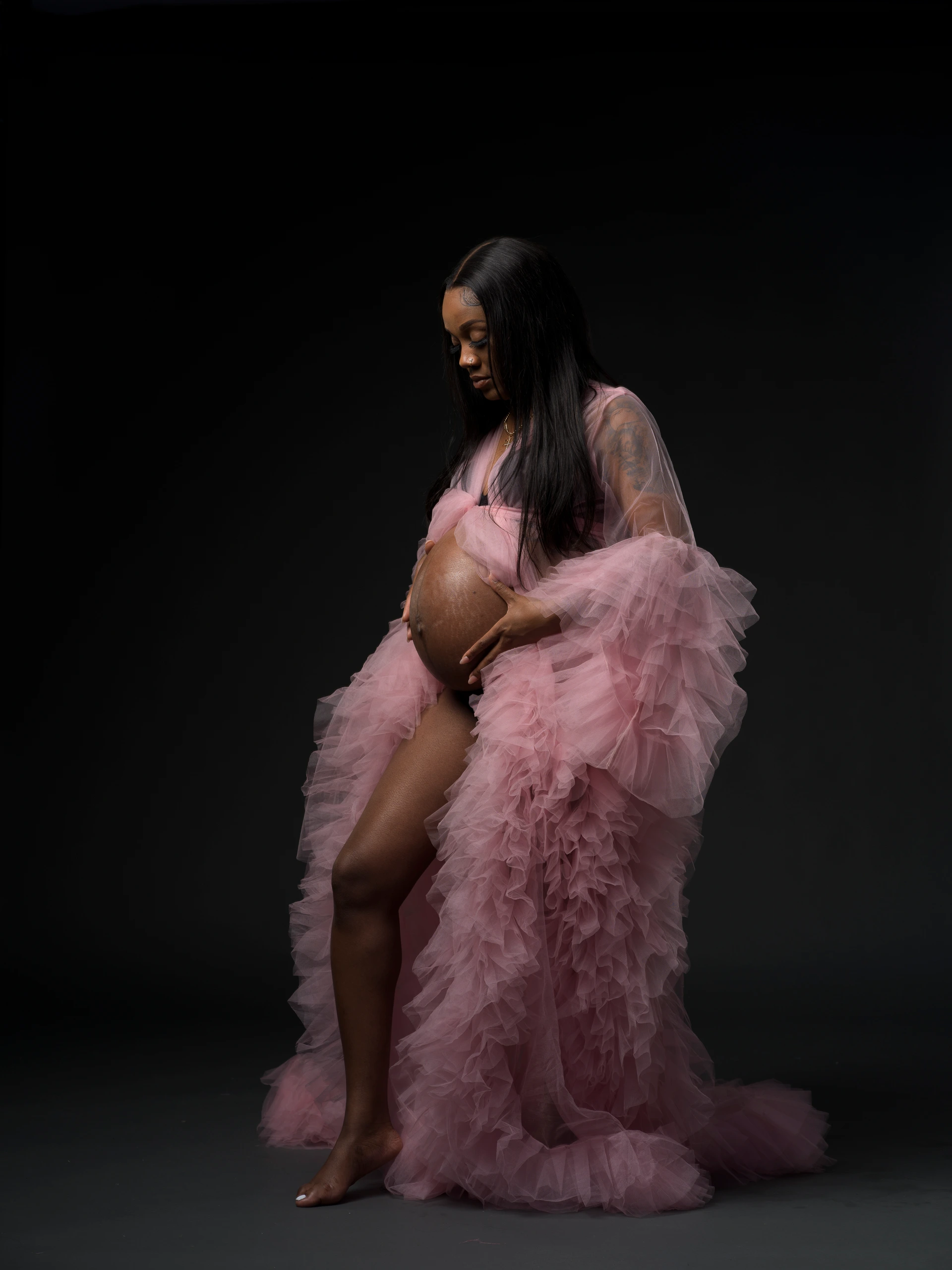 pink smoke tulle maternity portrait before editing by Motiontography